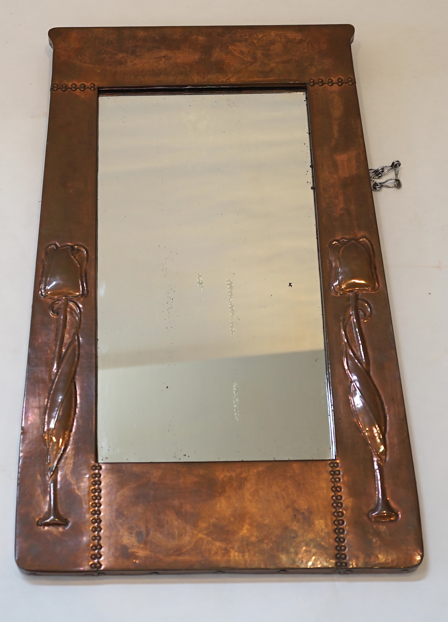 A Liberty Arts & Crafts copper wall mirror